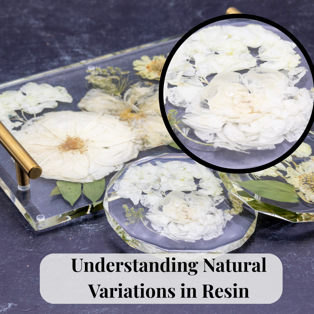 Image of a resin serving tray and coasters made of pressed flowers. The flowers are white and show transparent spots in resin, close up of the white hydrangea showing translucent spots in resin.