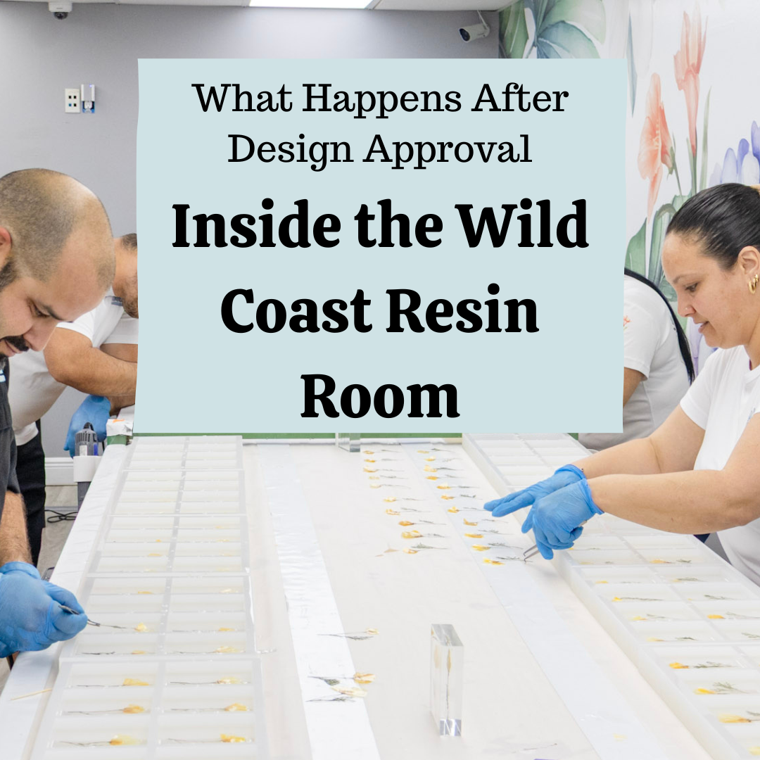 flower preservation artists working in a professional resin room on laying customer designs in epoxy resin molds at Wild Coast Flower Preservation in South Florida