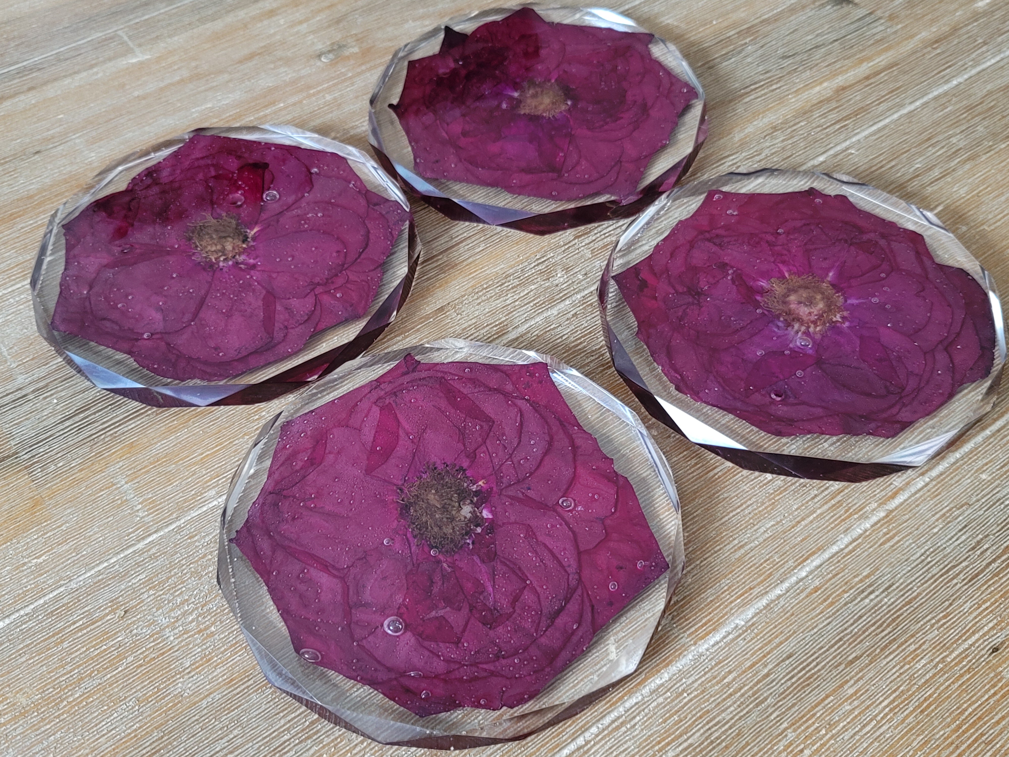 Wide lifestyle photo of a resin flower keepsake displayed in a bright interior