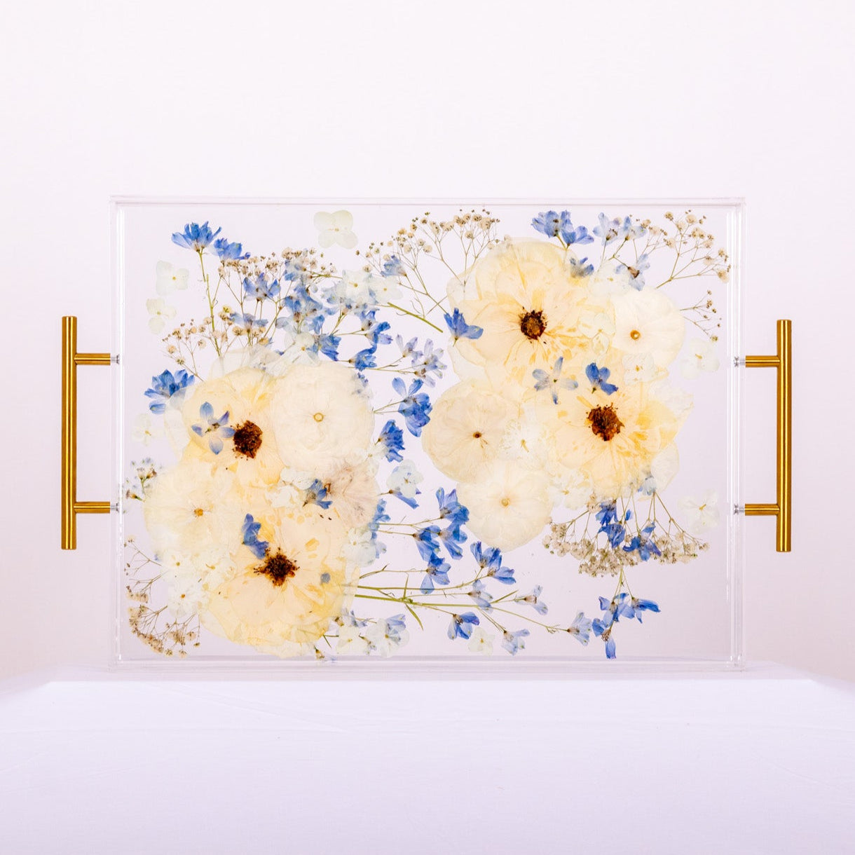 White rose and blue hydrangea preservation in acrylic serving tray with resin flowers