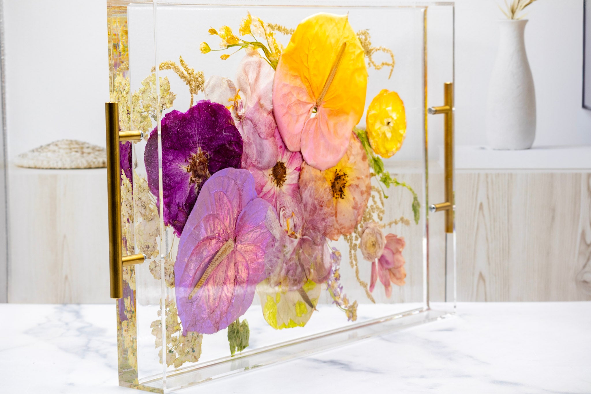 Standing view of Preserved tropical bouquet preservation in pressed flower serving tray with raised edges and gold handles