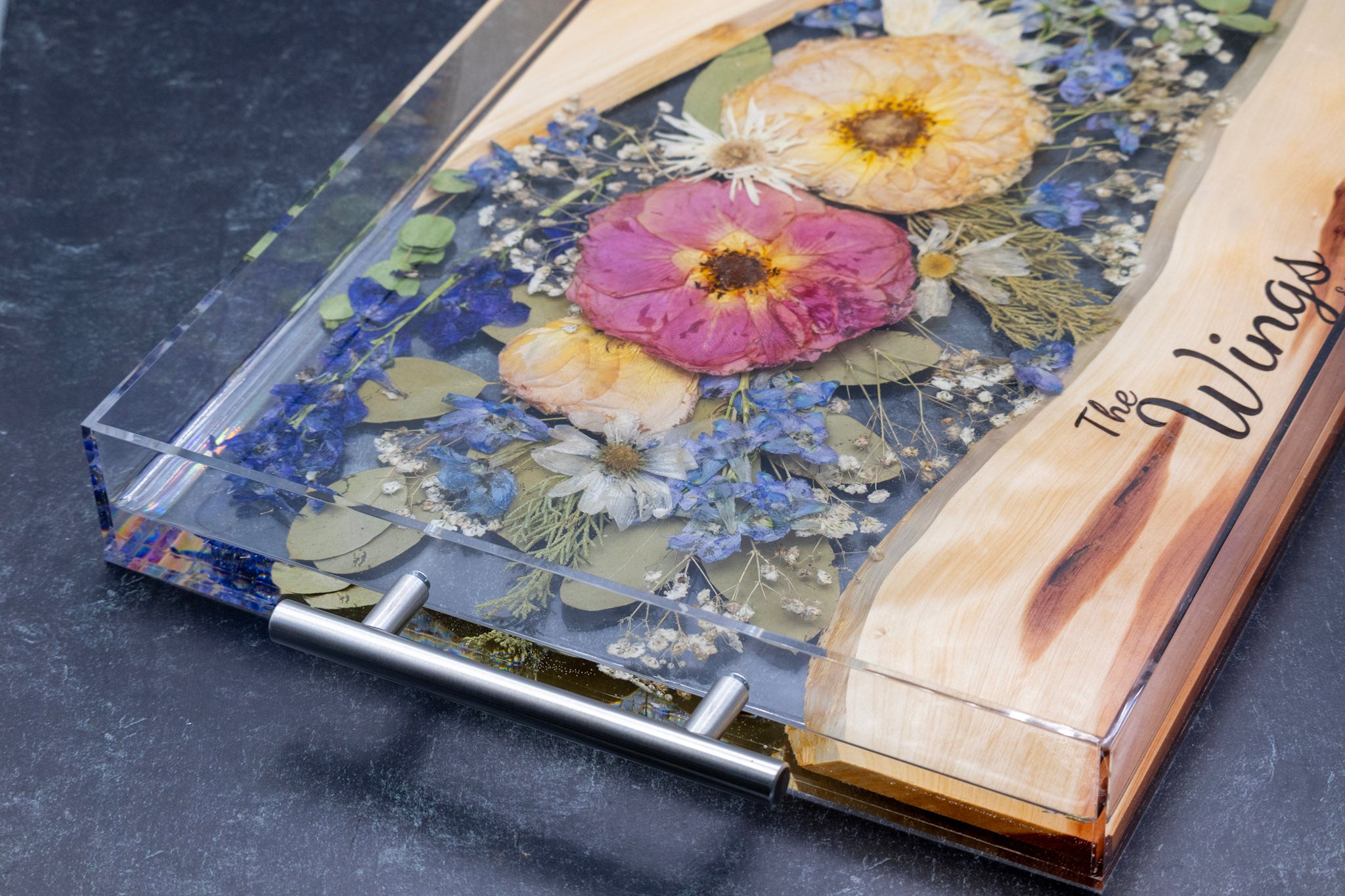 Acrylic serving tray with silver handles resin flower preservation live edge wood with engraved text, "the Wings" in script text