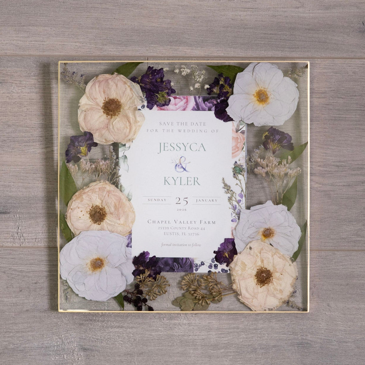 pressed wedding bouquet and invitation preserved in resin wall art keepsake flower preservation wall decor on a wood background