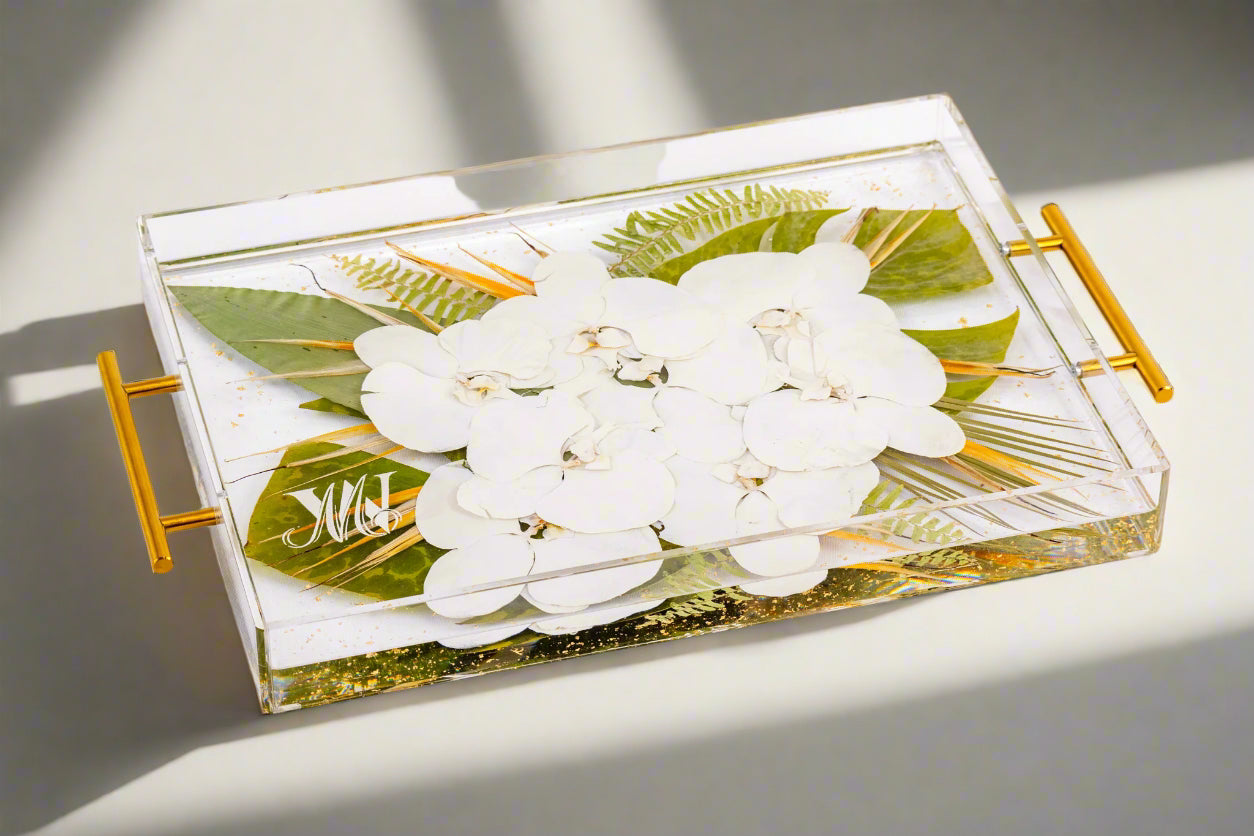 preserved orchids and tropical wedding flower preservation in pressed bouquet serving tray with monogram and gold handles