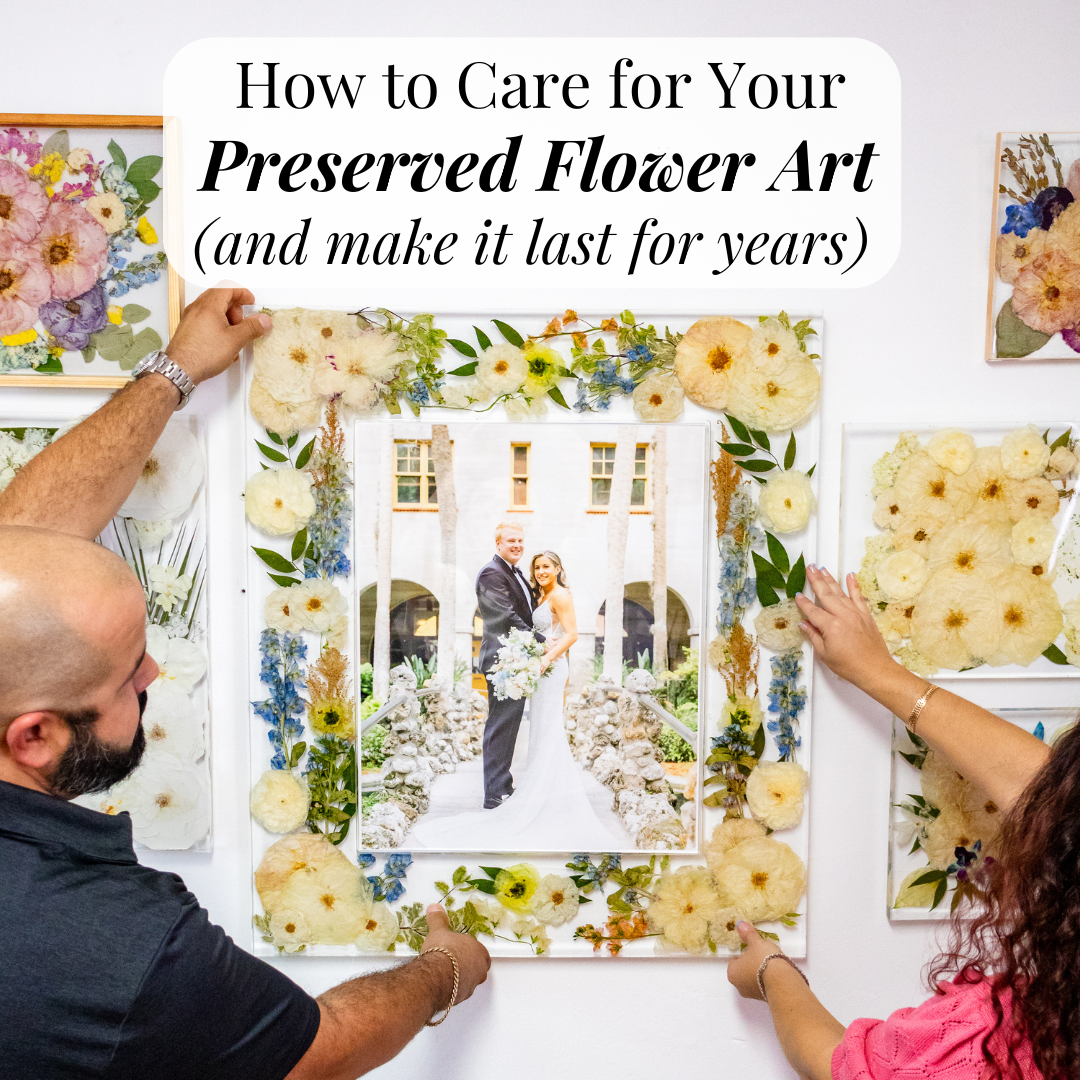 Couple hanging a larger preserved flower photo frame on the wall together with title "How to care for your preserved flower art and make it last for years. 