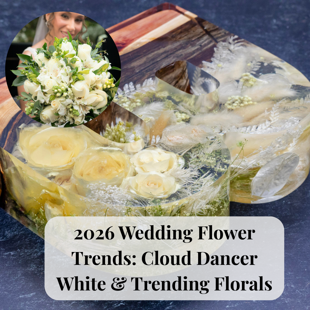 Photo of fresh white wedding bouquet with a resin letter block showing white preserved flowers and text: 2026 Wedding Flower Trends: Cloud Dancer White &Trending Florals