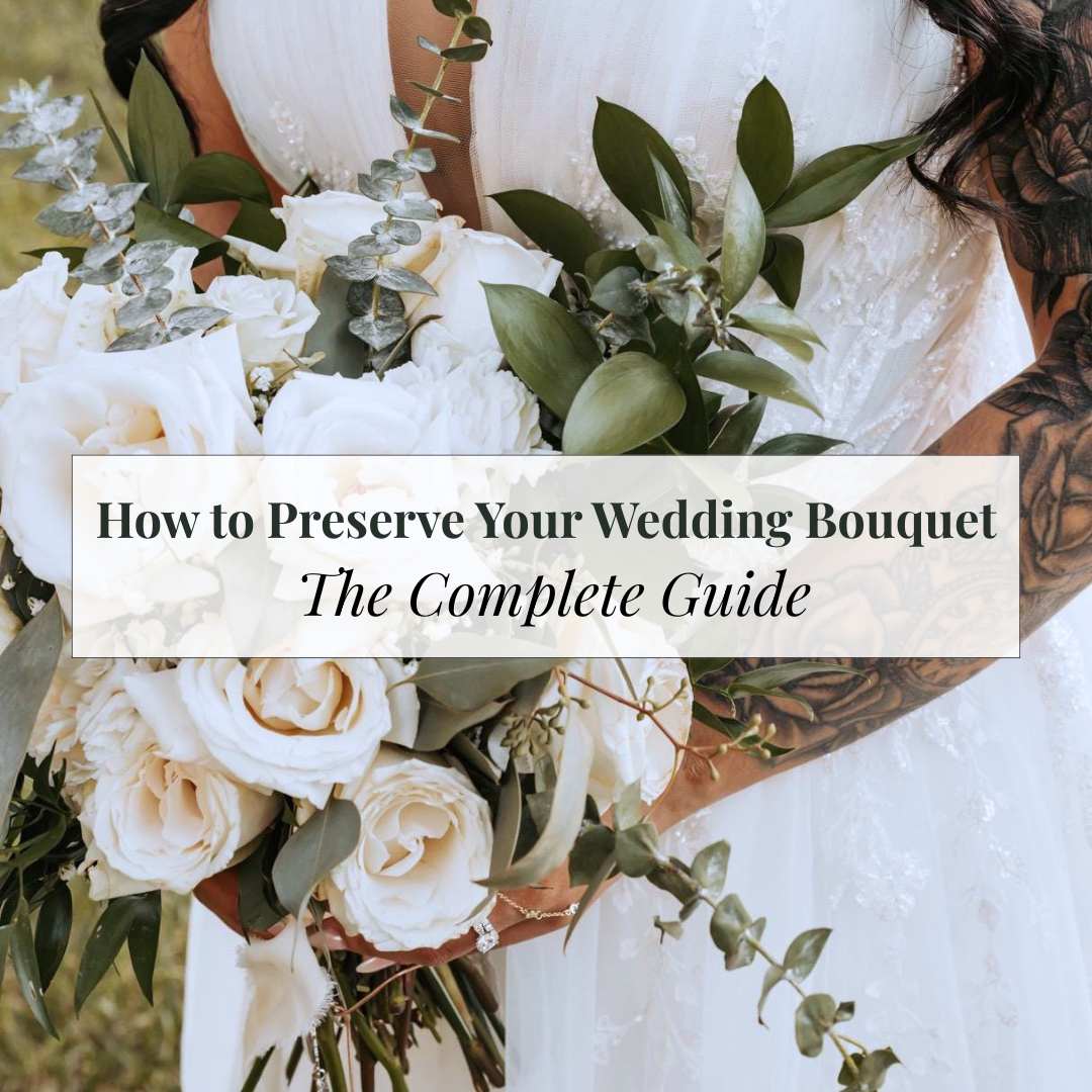 Fresh white wedding bouquet held by bride and text that reads the complete guide to how to preserve your wedding bouquet