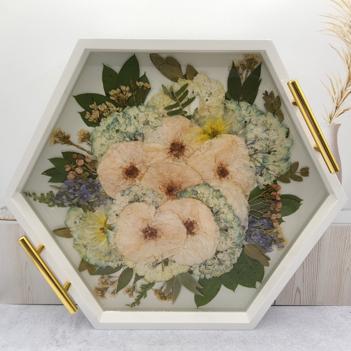 white wood pressed flower hexagon ottoman tray with blue hydrangea and white rose.