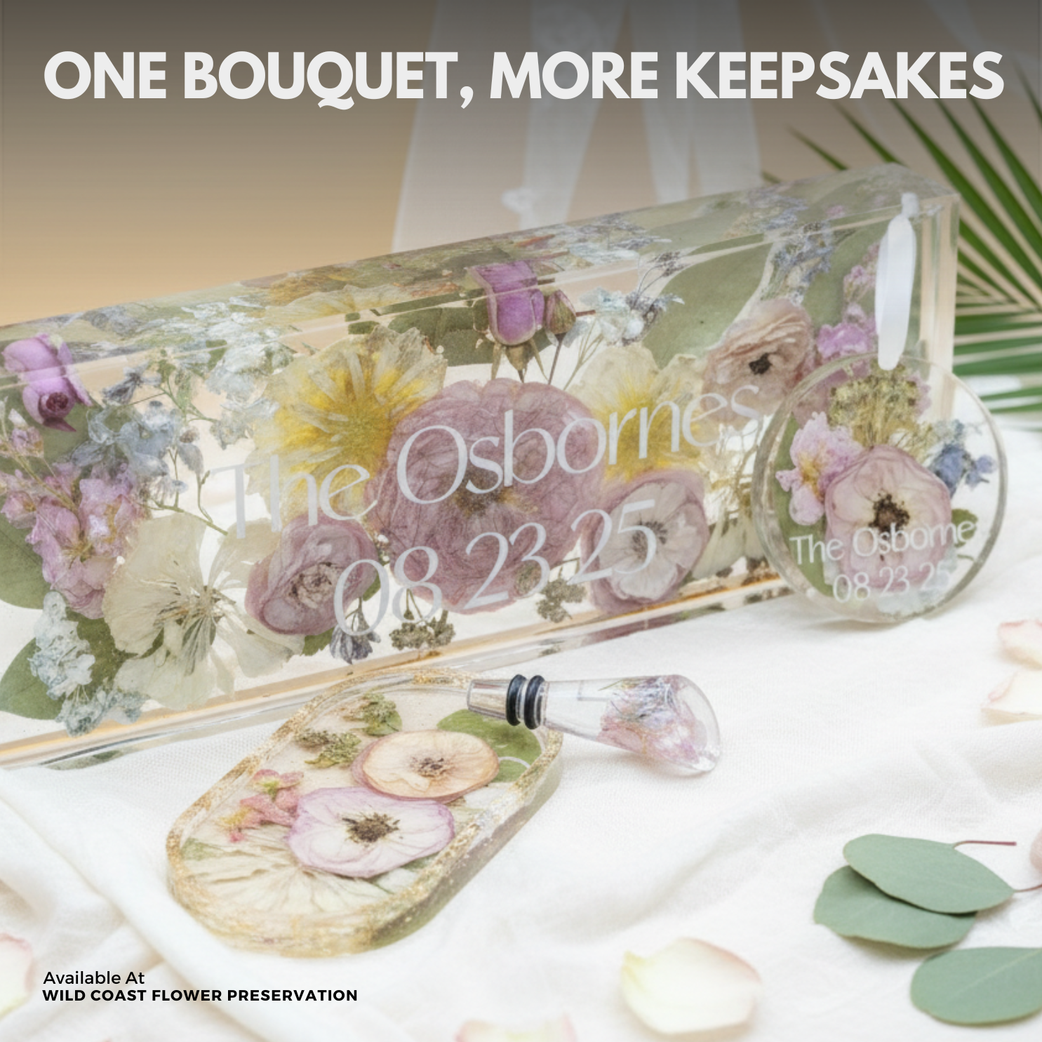 Floral preservation name block with personalized ornament, ring dish and wine stopper on a white background