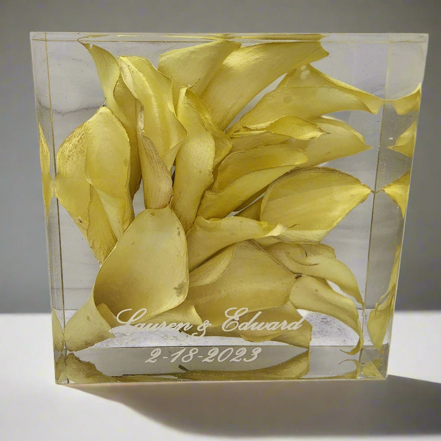 Calla Lillies preserved in 5 inch bouquet block (5x5x3) with custom text written in white script for name and date of wedding.