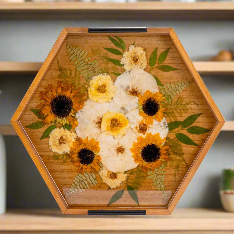 preserved Sunflower and yellow roses inside a pressed flower hexagon ottoman tray in a kitchen setting