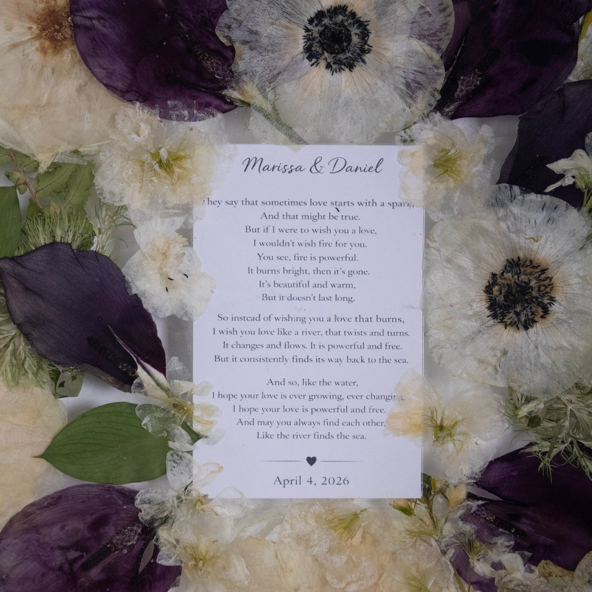 Close up shot of wedding poem encased in resin flower preservation frame