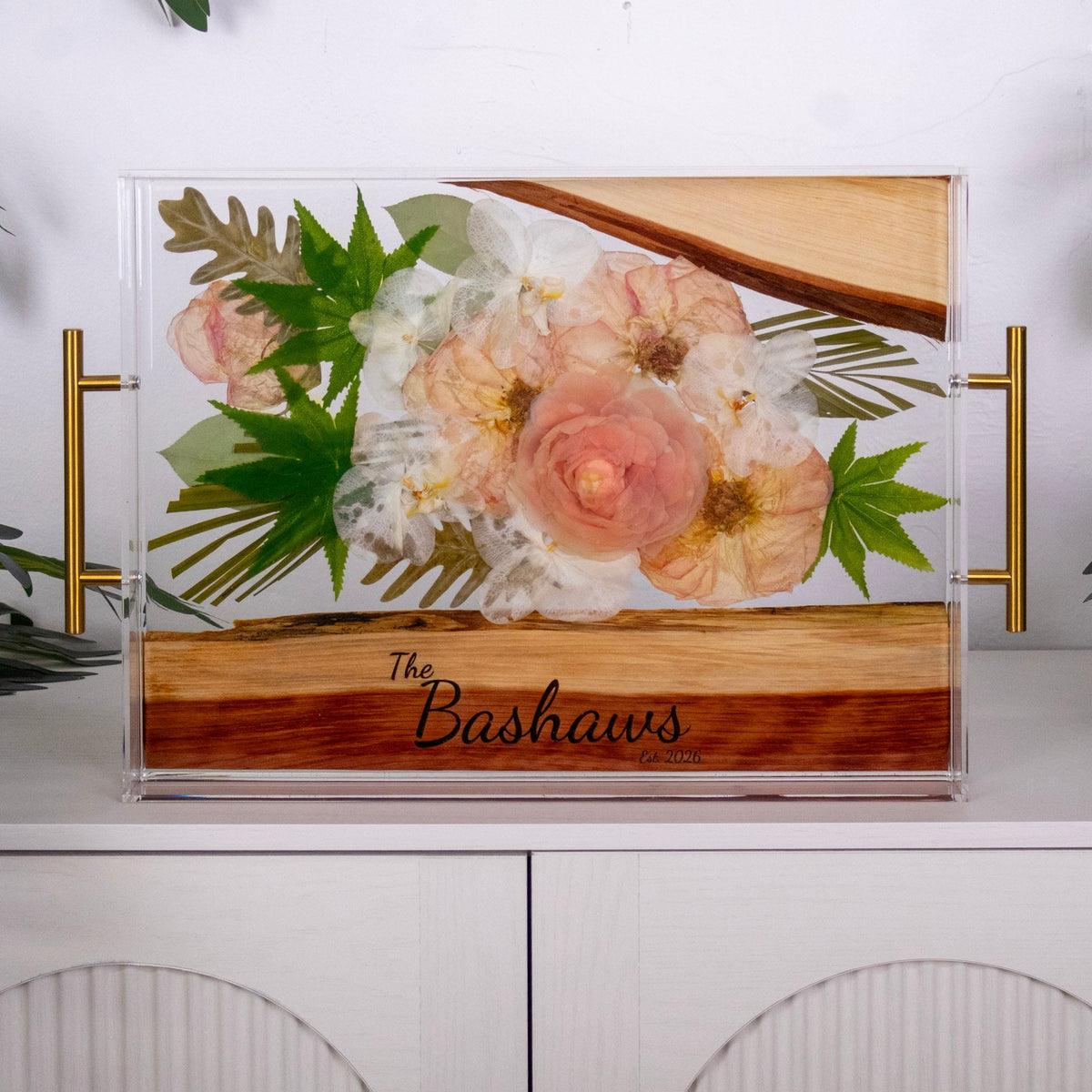 Fake and Real Bouquet Preservation in Resin Wood Acrylic Tray with laser engraved name and date on a white countertop