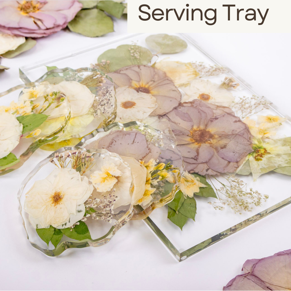 Preserved flower tray and geode coasters with a variety of flowers on a white background.