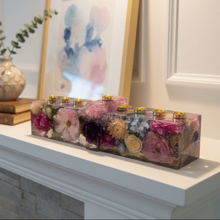 Premade preserved flower menorah with whole blooms in crystal-clear resin and raised Shamash candle. Ready-to-ship Judaica keepsake and gift.
