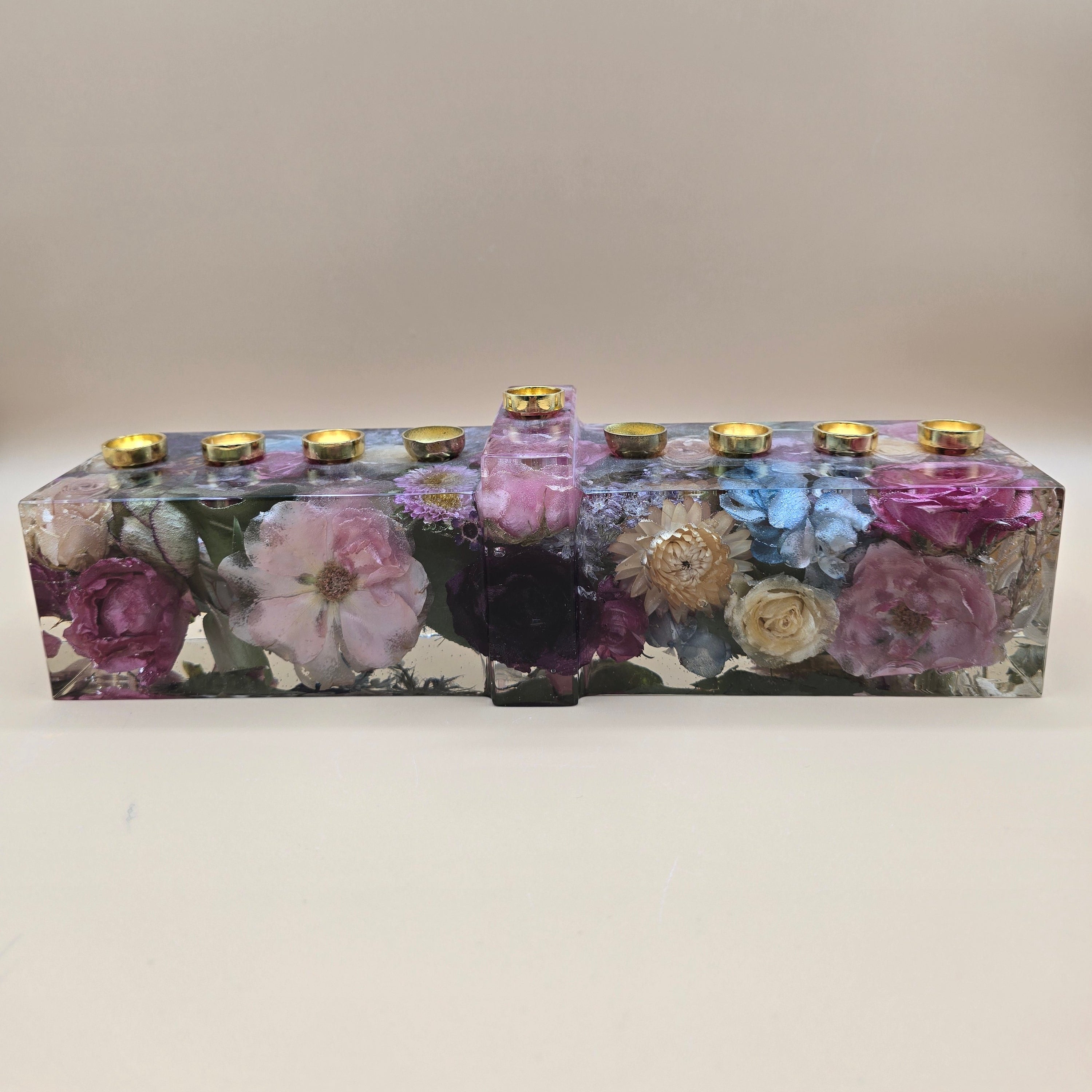 Resin menorah with preserved flowers and roses cast in resin