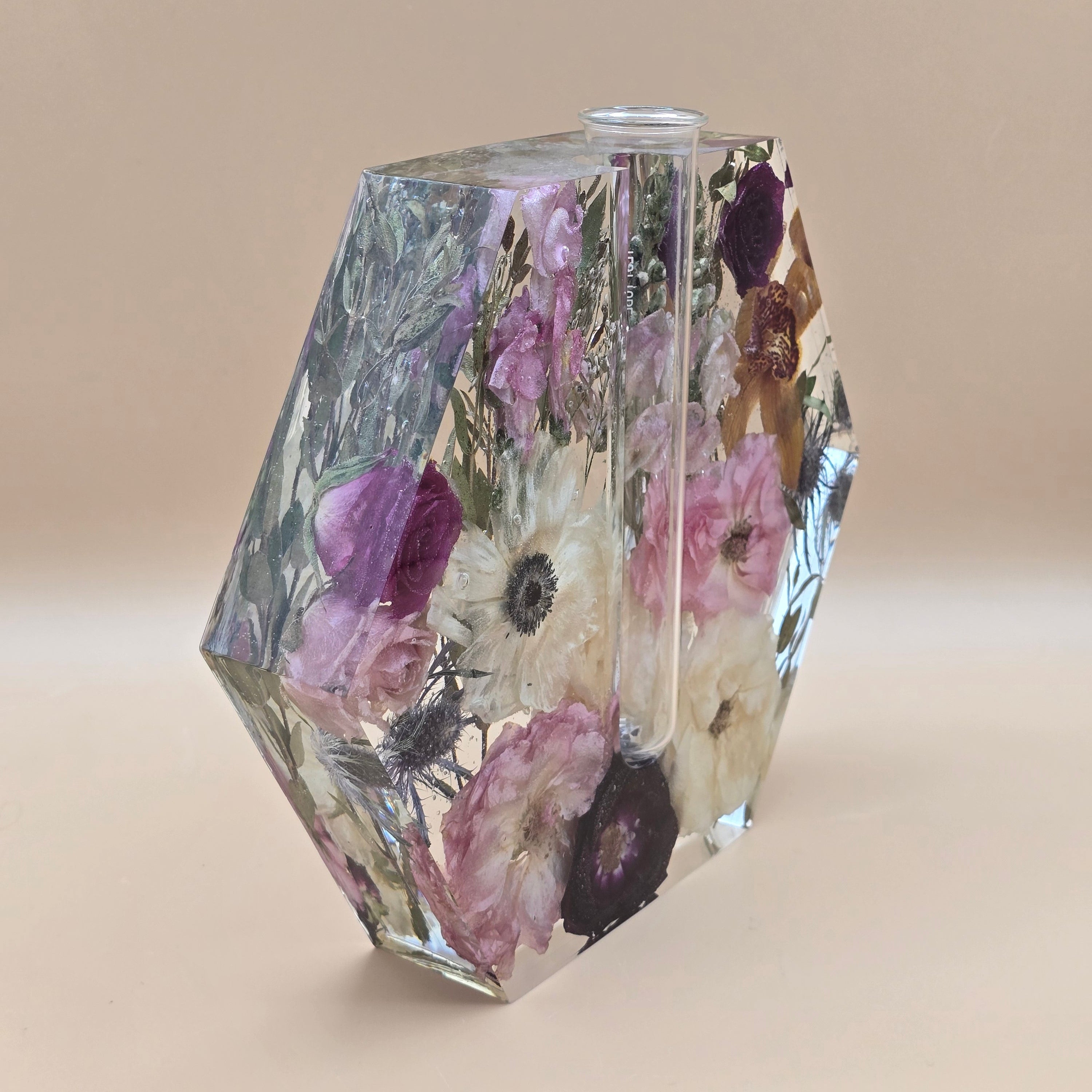 Bud Vase Side View Resin encased flowers in a hexagon-shape with glass tube for propagation flower